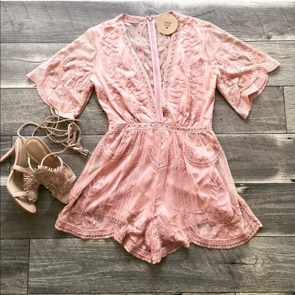 Honey Punch blush romper with plunge neck
